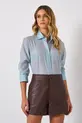 SHORTS COM BOLSO EM COURO ECOLÓGICO