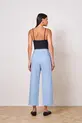 CALÇA COM BOLSO FACA EM LINHO SIDNEY